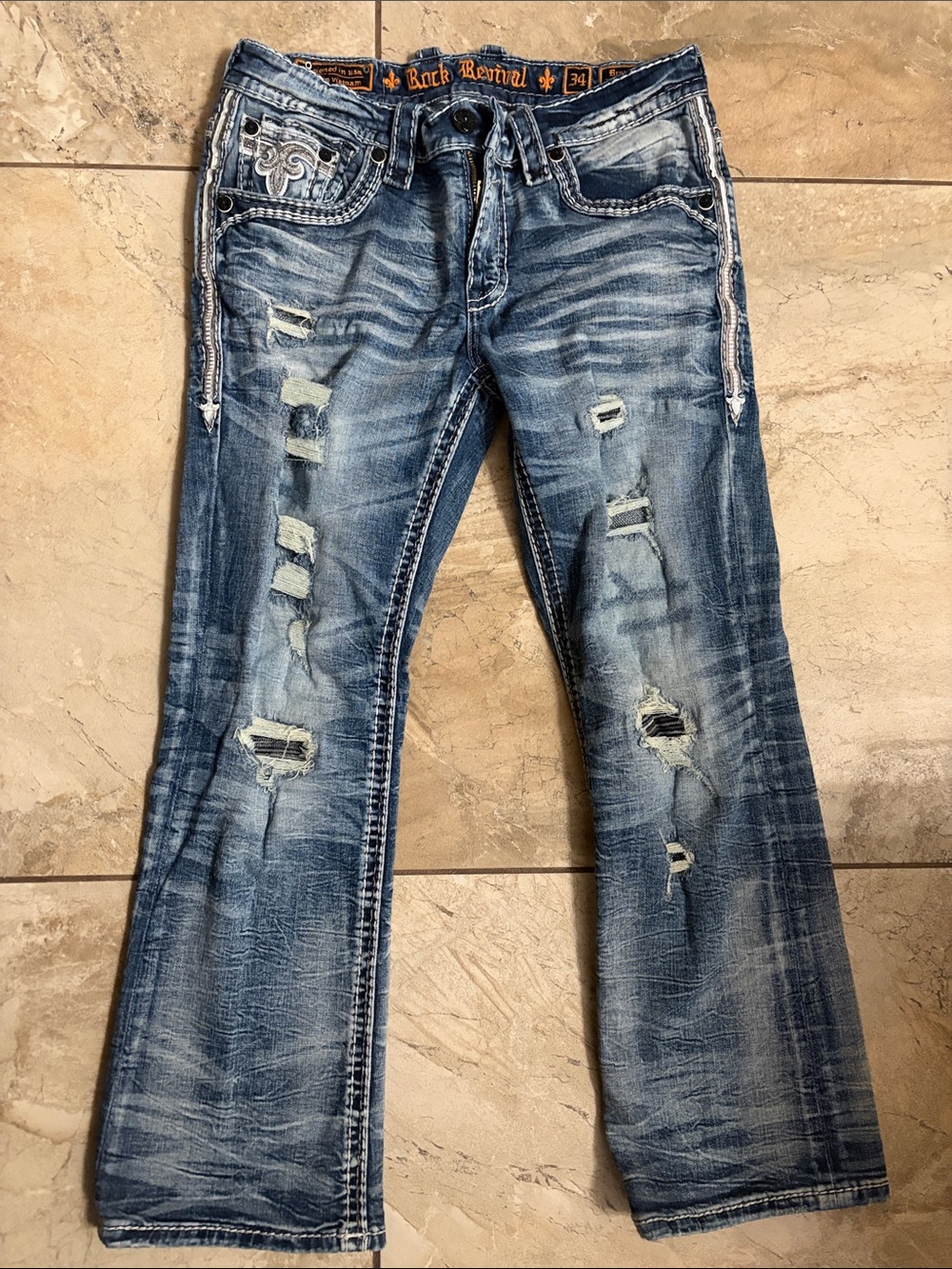 Rock Revival Ripped Bootcut Jeans in Faded Blue
